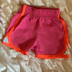 Under Armour running shorts- Size 12M